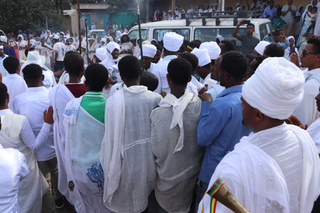 January 19, 2019: group of unidentified people dressed in traditional attire during the Timkat holiday, the important Ethiopian Orthodox celebration of Epiphanyのeditorial素材