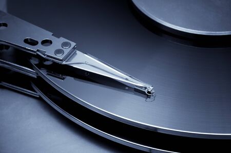 Vintage hard disk detail. Blue toned imageの写真素材