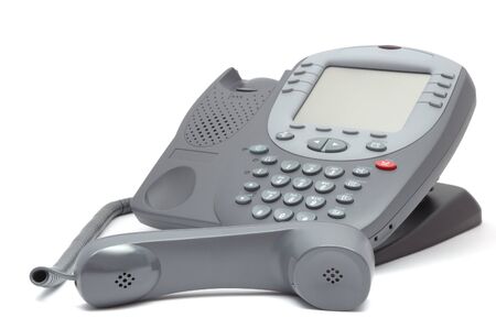 Modern office system phone with large LCD screen. Isolated on whiteの写真素材