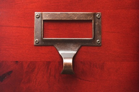 Lustrous Wooden Card File Cabinet in Dramatic LIghtの写真素材