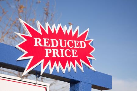 Red Reduced Price Burst Real Estate Sign.の写真素材