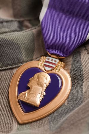 Purple Heart War Medal on Camouflage Materialの写真素材
