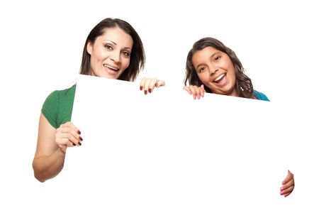 Pretty Hispanic Girl and Mother Holding Blank Board Isolated on a White Background.の写真素材