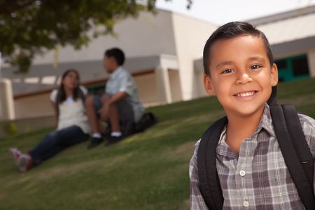 Happy Young Hispanic Boy with Backpack Ready for School.の写真素材