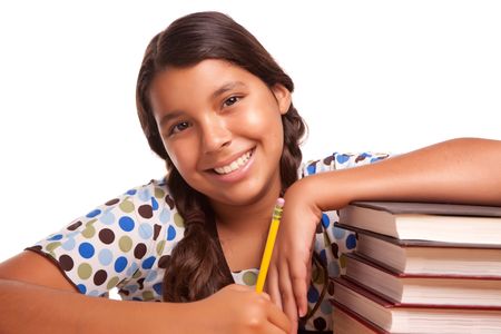 Pretty Smiling Hispanic Girl Studying Isolated on a White Background.の写真素材