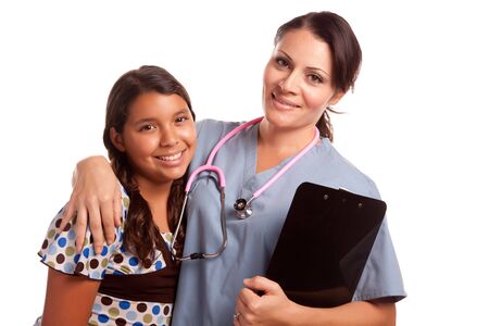 Pretty Hispanic Girl and Female Doctor Isolated on a White Background.の写真素材