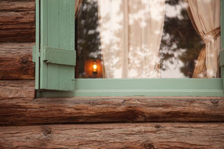 Classic Vintage Log Cabin Window Abstract with Lantern- Tallac Historic Site - Lake Tahoe, California..の写真素材