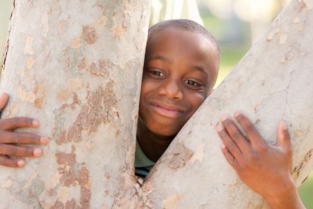 Young African American Boy Having Fun In The Park.の写真素材
