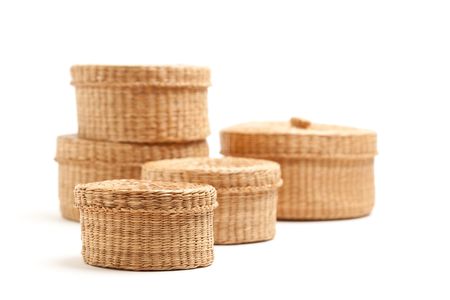 Stack of Various Sized Wicker Baskets Isolated on White.の写真素材