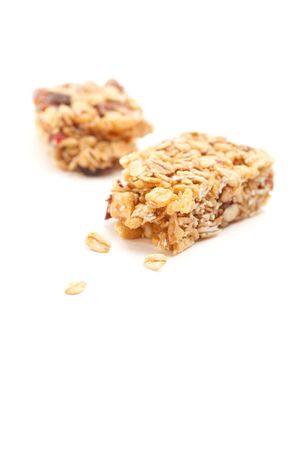 Broken Granola Bar Isolated on a White Background with Narrow Depth of Field.の写真素材