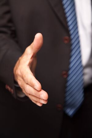 Businessman Reaching His Hand Out for a Handshake.の写真素材