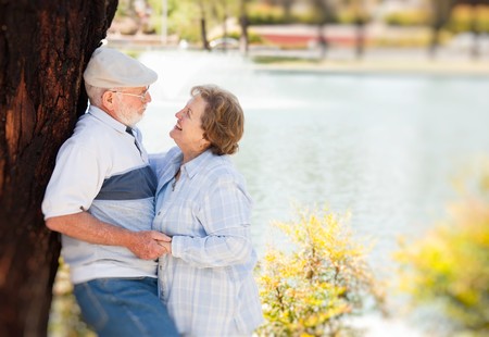 Happy Senior Couple Enjoying Each Other in The Park.の写真素材
