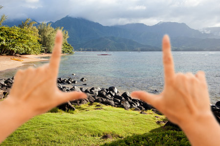 Hands Framing Beautiful Hanalei Bay Late One Summer Afternoon.の写真素材
