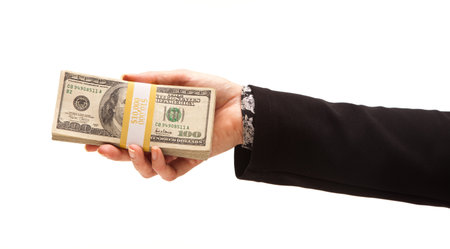 Woman Handing Over Hundreds of Dollars Isolated on a White Background.