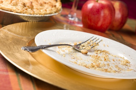 Apple Pie, Empty Plate with Remaining Crumbs and Fork.の写真素材