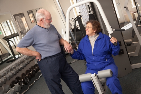 Active Senior Adult Couple Working Out Together in the Gym.の写真素材