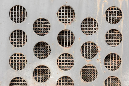 Abstract Vintage Metal Grid Circles Background.