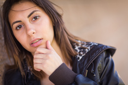 Beautiful Meloncholy Mixed Race Young Woman Portrait Outside.の写真素材