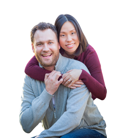 Mixed Race Caucasian and Chinese Couple Isolated on a White Background.の写真素材