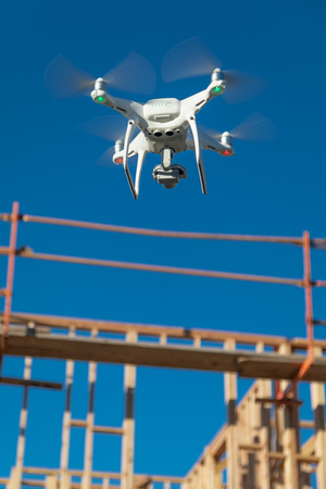Drone Quadcopter Flying and Inspecting Construction Site.の写真素材