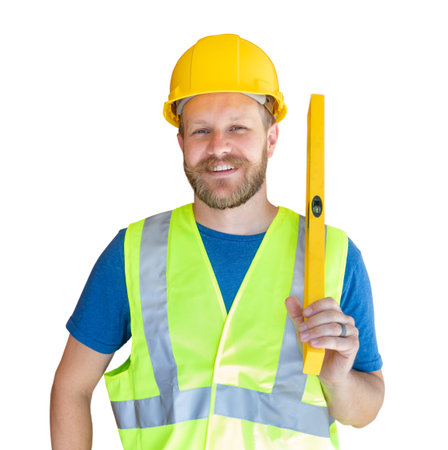 Caucasian Male Contractor With Hard Hat, Level and Safety Vest Isolated.