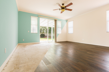 Empty Room with Cross Section Showing Before and After With New Wood Floor and Paintの写真素材