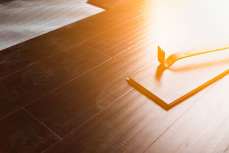 Pry Bar Tool with New Laminate Flooring Abstract.の写真素材