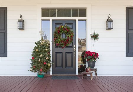 Christmas Decorations At Front Door of House.の写真素材
