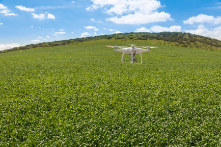 Drone Unmanned Aircraft Flying and Gathering Data Over Country Farmland.