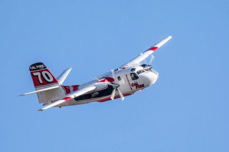 Winchester, CA USA - June 14, 2020: Cal Fire aircraft preparingto drop fire retardant on a dry...