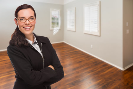 Woman In Empty Room of New House.