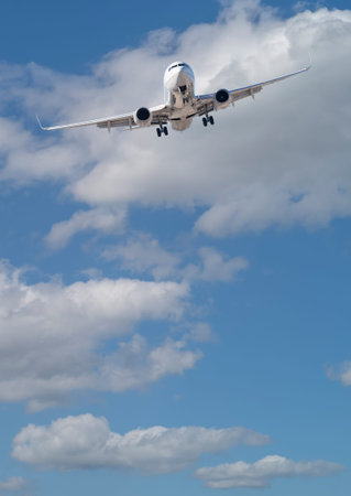Passenger Airplane In Approach for Landing with Beautiful Blue Sky.