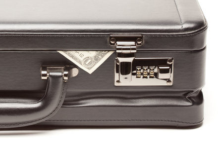 Black Leather Briefcase & Dollar Corner Exposed.の写真素材