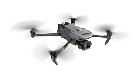 Front View of a Drone Quadcopter UAV In Flight Isolated on a White Background.の写真素材