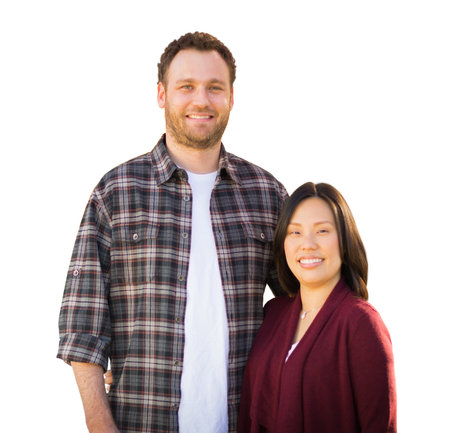 Mixed Race Chinese and Caucasian Couple Portrait Isolated on a White Background.の写真素材