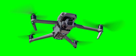 Isolated Unmanned Aircraft System (UAV) Quadcopter Drone In The Air Over A Green Screen.の写真素材