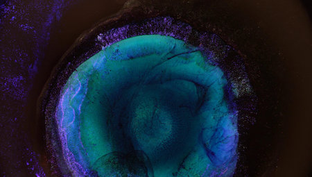 The Universe, a cluster of galaxies, a beam of light in space. Abstract neon glow and blurry rays of...