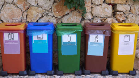 Different Colored Recycle Waste Bins for plastic, metal, paper, glass, organicの写真素材