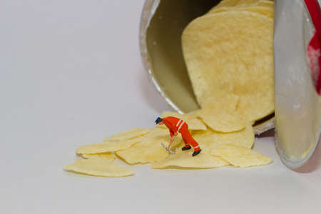 Toy concept of hard work, chips destruction, trade competitionの写真素材