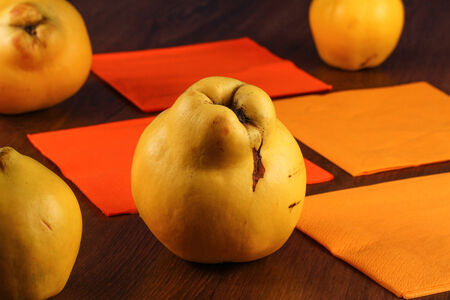 Quince on the wood tableの写真素材