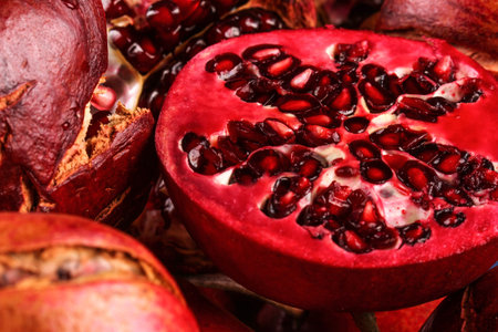 The half pomegranate and many pomegranate too