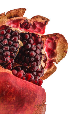 The Single Macro Pomegranate on white backgroundの写真素材