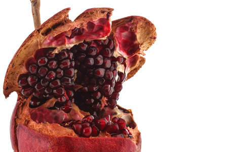 The Open Pomegranate On the White Backgroundの写真素材