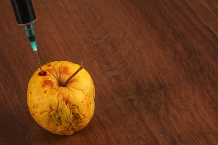 Hormone Apple on the Woodの写真素材