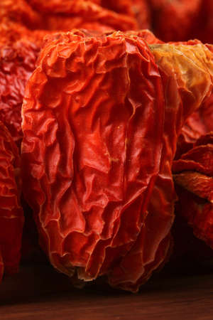 Dried red peppers on the woodの写真素材