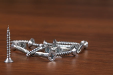 The Grey Screw on the wood