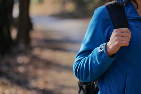 The woman walking in the nature with backpack.の写真素材