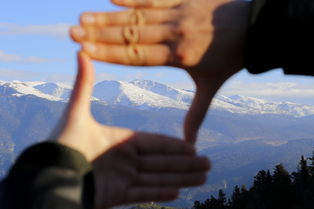 This is a very popular position. This time with snowy mountain.の写真素材
