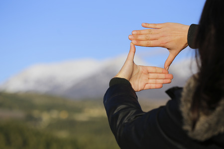 This is a very popular position. This time with snowy mountain.の写真素材