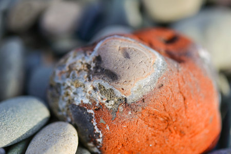 This is a colored stone on the edge on the Mediterranean coast.